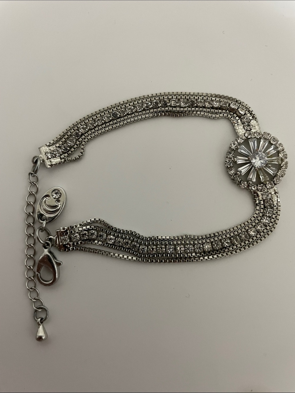Silver Crystal Multi-Row Bracelet with Sunburst Accent